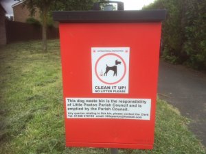 Red dog waste bin